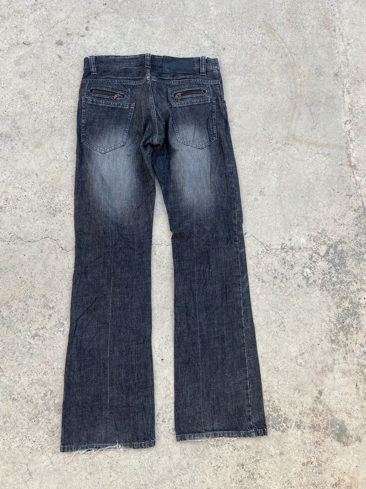 Flare Tete Homme jeans by issey Miyake designer distressed - www