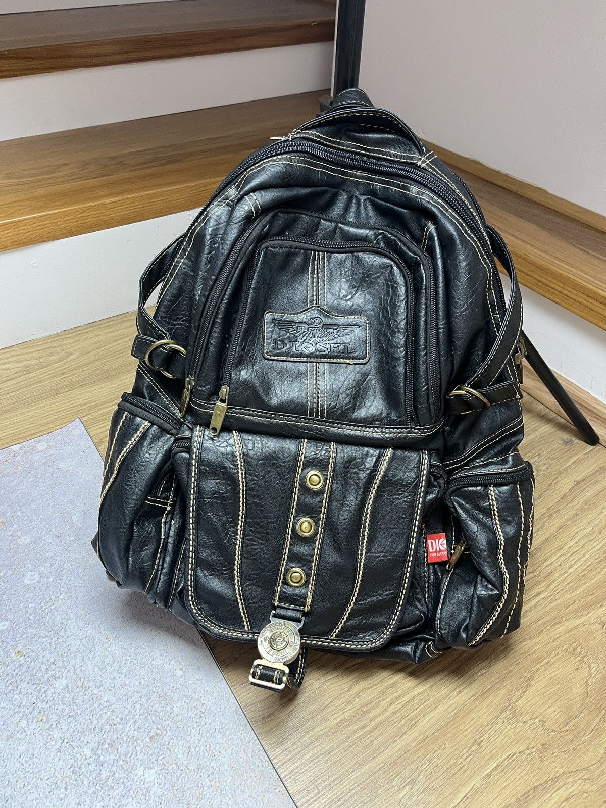 diesel backpack leather with front logo D’ BACKPACK by Diesel is the perfect choice for discerning clients who value refined simplicity and uncompromising quality Bags > Backpacks | Authentic