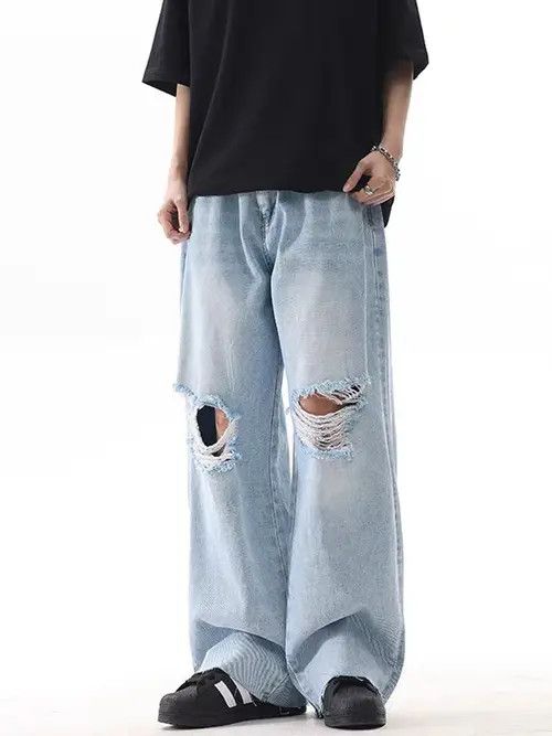 vintage light blue ripped washed loose jeans