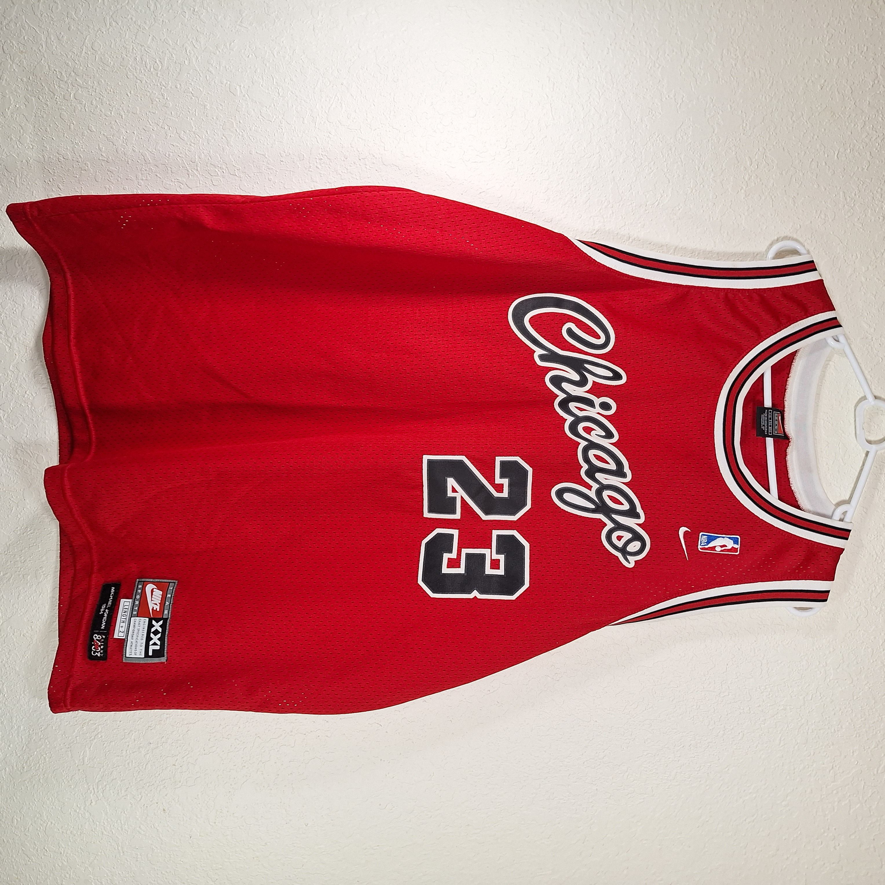 image of NBA x Nike 90's Michael Jordan Nike Team Sports Jersey in Red, Men's (Size 2XL)