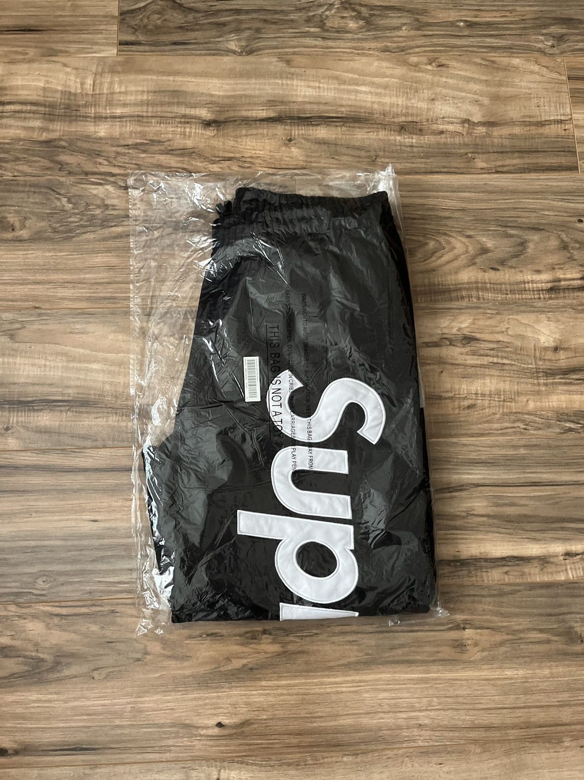 image of Supreme Satin Appliqué Sweatpant in Black, Men's (Size 36)