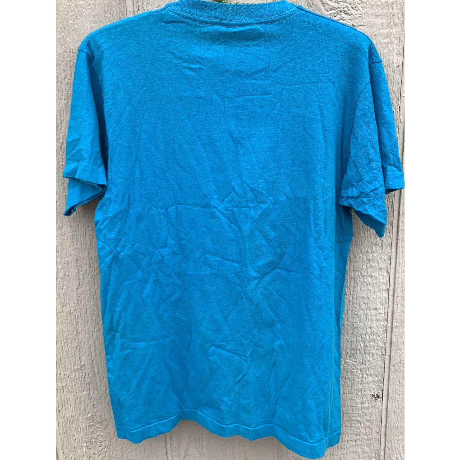 Fruit Of The Loom VINTAGE Gilroy Garlic Festival GGFA Inc Parking Committee 1993 t shirt M blue cotton Men Turquoise Graphics Tee Sportswear/Beach 1990s Shirt Size US M / EU 48-50 / 2 - 4 Thumbnail