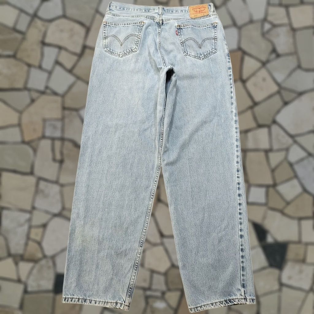 Levi's VINTAGE Levi's 560 Jeans Mens 34x33 Loose Fit Taper Leg Light Blue Denim 5-Pocket Grooved Belt Loops Streetwear Retro 90s Motorcycle Western Rock N/A Size US 34 / EU 50 - 1 Thumbnail