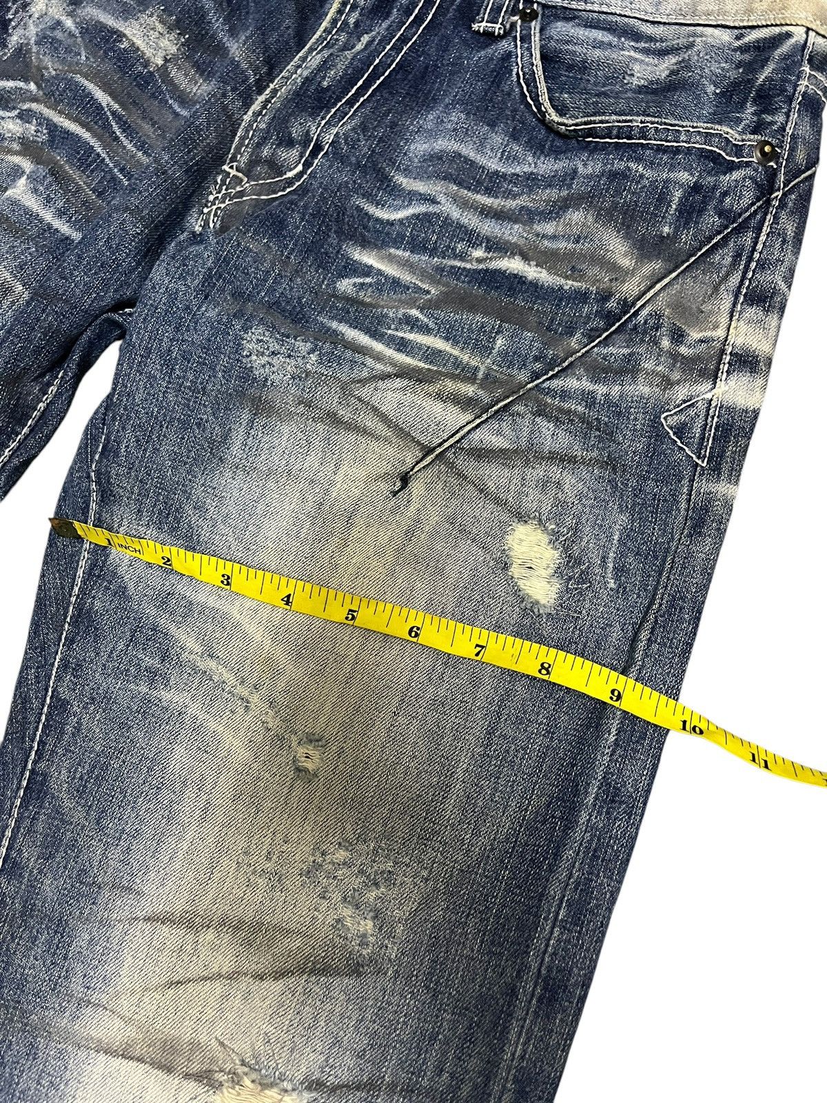 Neutral Infinity Clawmark Seditionaries Distressed Denim