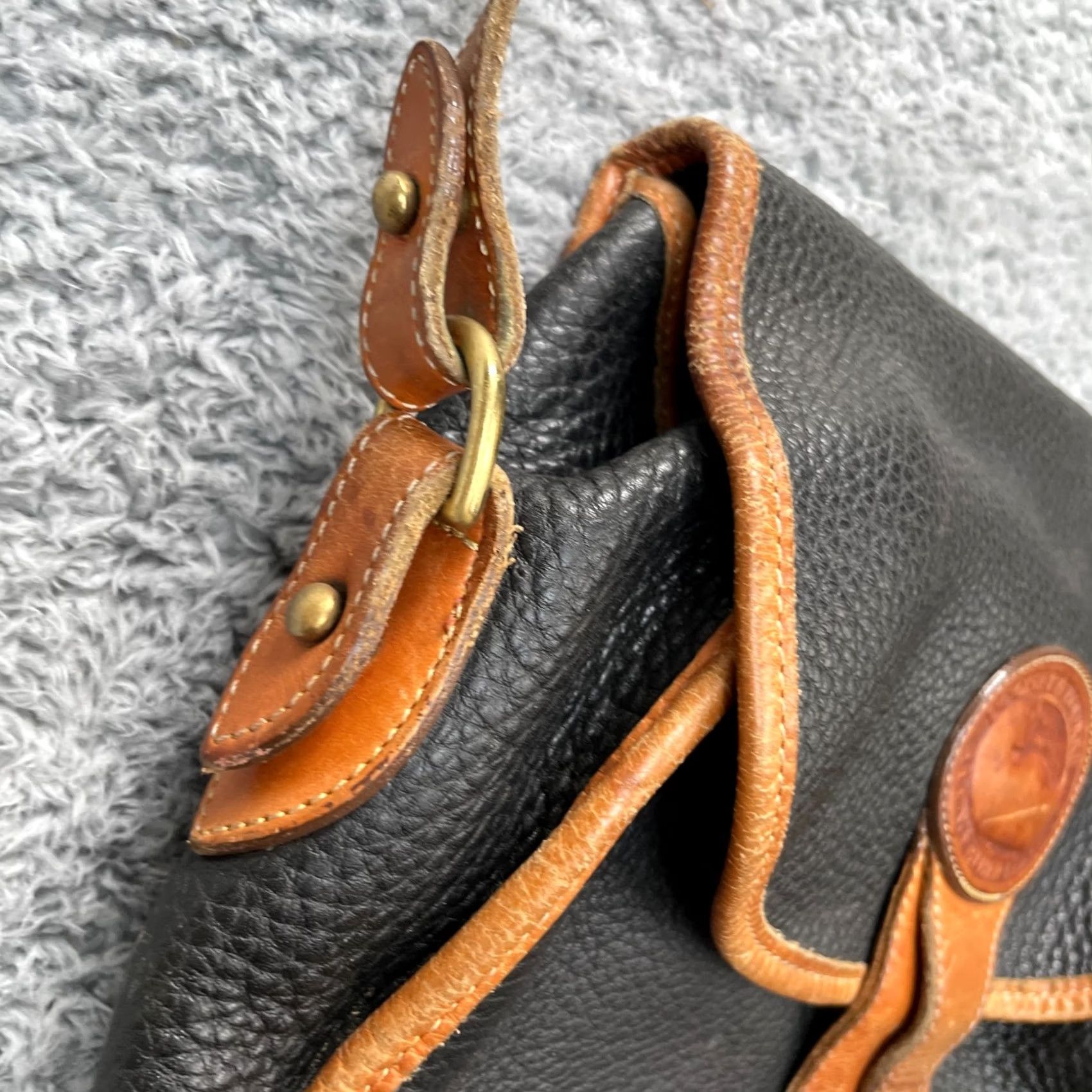 Dooney & Bourke VINTAGE Dooney & Bourke Essex Crossbody Bag Womens Black Leather Adjustable Strap Brown Hardware Gold Buckle Pebbled Leather Size ONE SIZE - 3 Thumbnail