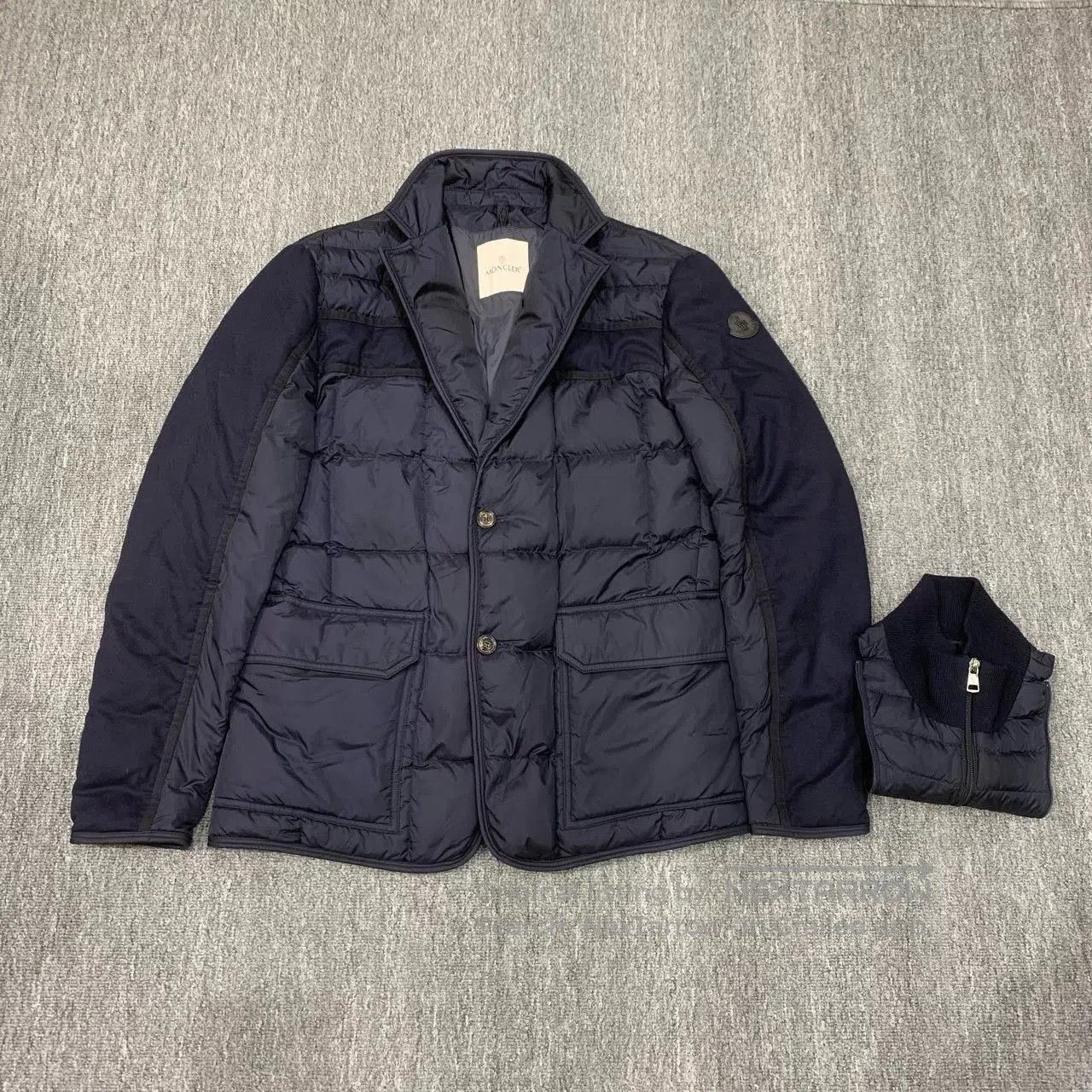 moncler deep blue down jacket with detachable design.
