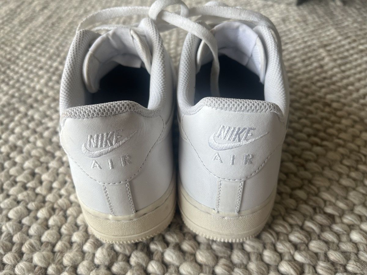 Nike All white Nike Air Force 1 low top sneakers Size US 10 / EU 43 - 6 Thumbnail
