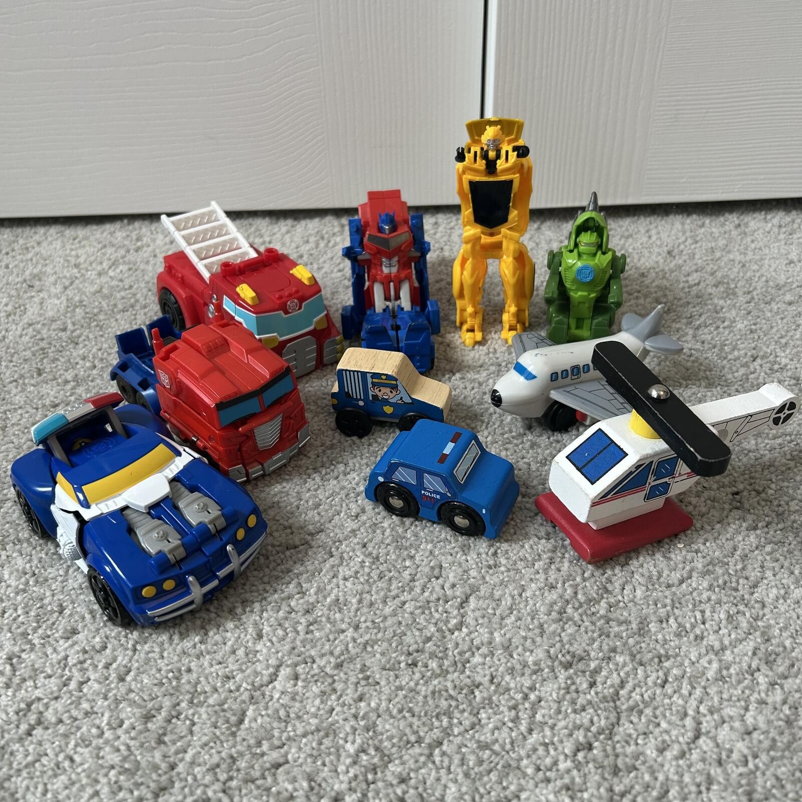 Transformers 10 Toy Lot,6 TRANSFORMERS,4 misc toys; cars,plane,helicopter Size ONE SIZE - 1 Thumbnail