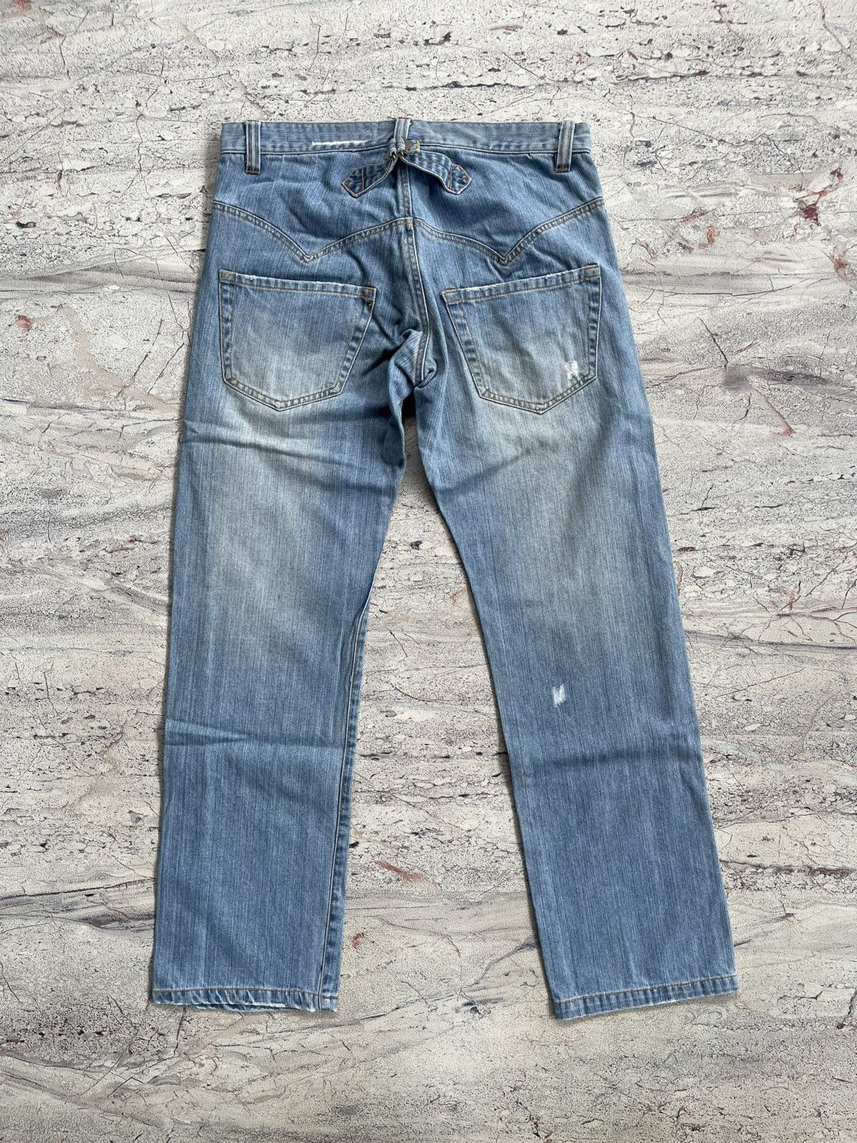 Sunao kuwahara distressed jeans by issey miyake