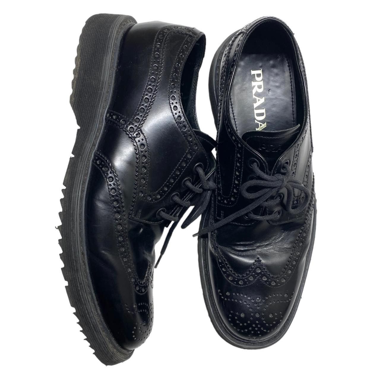 image of Prada Leather Wing Tip Dress Shoes Made In Italy in Black, Men's (Size 8.5)