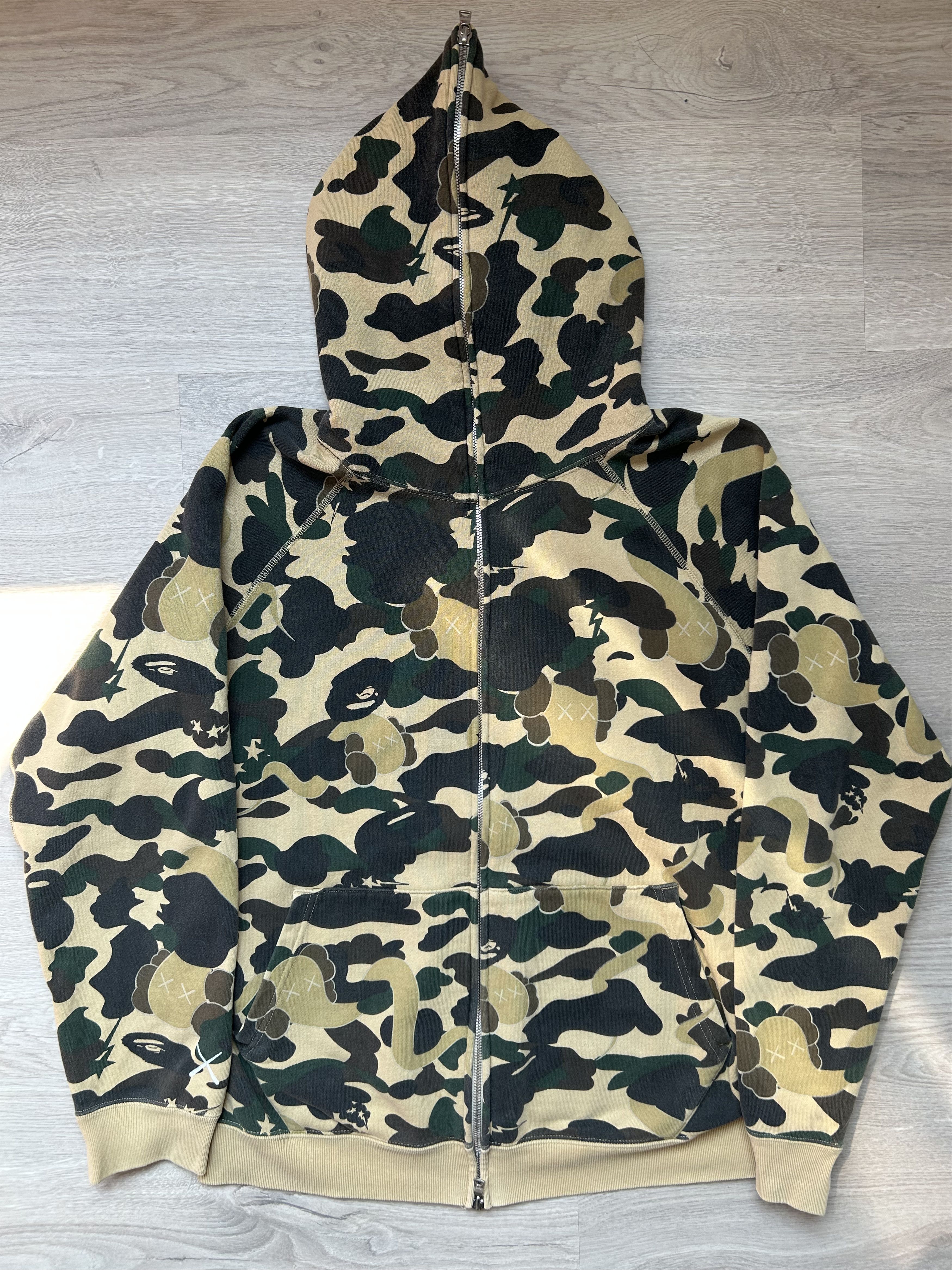 Bape × Kaws Bape x Kaws 1st Camo Bendy Full Zip Hoodie | Grailed