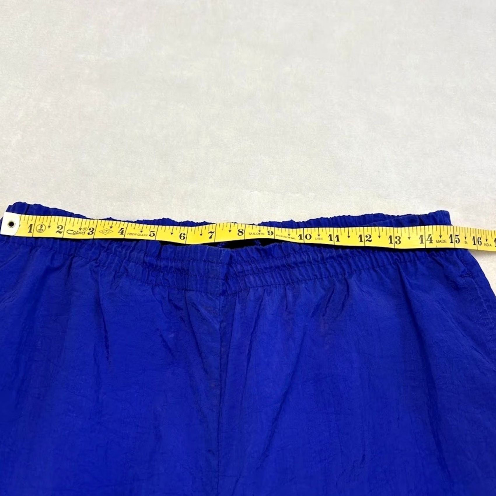 Nike VINTAGE Nike Track Pants M Blue Nylon Windbreaker Ankle Zip Embroidered Swoosh Size US 31 - 7 Thumbnail