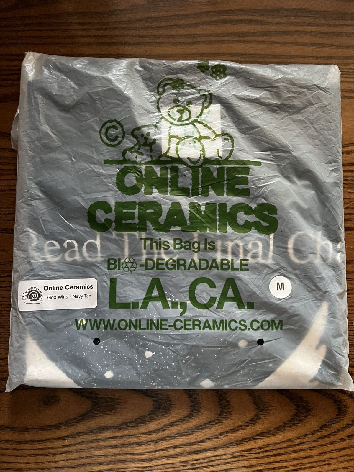 Online Ceramics God Wins Tee