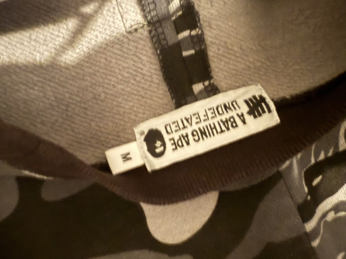 Bape × Undefeated Bape x Undefeated (open to offers) Size US M / EU 48-50 / 2 - 7 Thumbnail