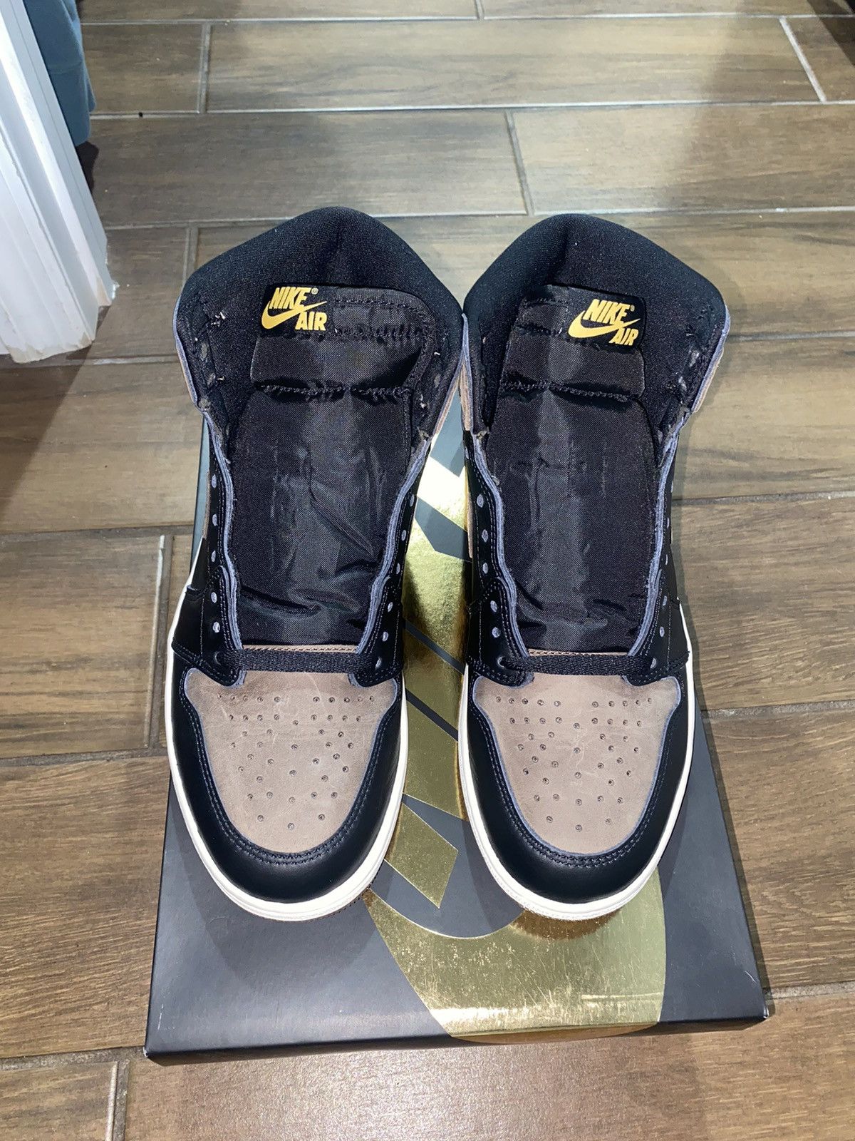 image of Jordan Nike Jordan 1 Retro High OG “Palomino” Shoes in Black, Men's (Size 8.5)