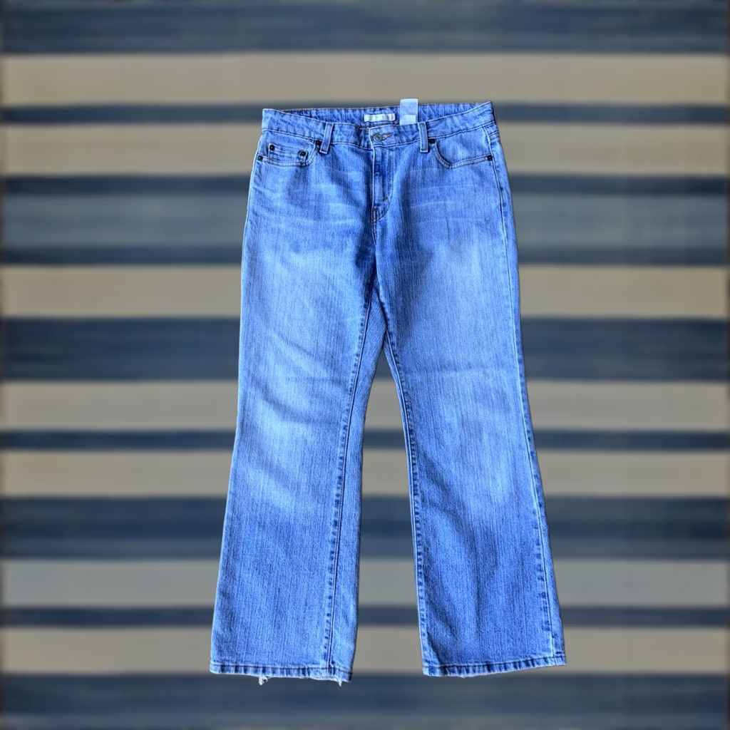 Levi's VINTAGE Levi's 515 Jeans Womens 12 Blue Bootcut Denim Light Wash - Levi's 515 Cowboy 5-Pocket Regular Rise Mid Inseam 27 in White? Size 34" / US 12 / IT 48 - 1 Thumbnail