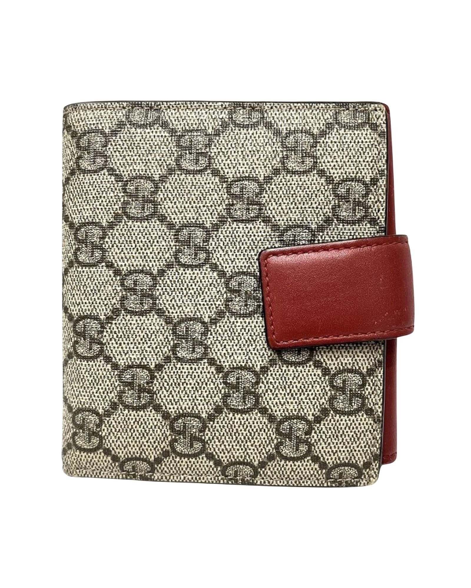 image of Gucci Gg Canvas Bi-Fold Wallet in Beige, Women's