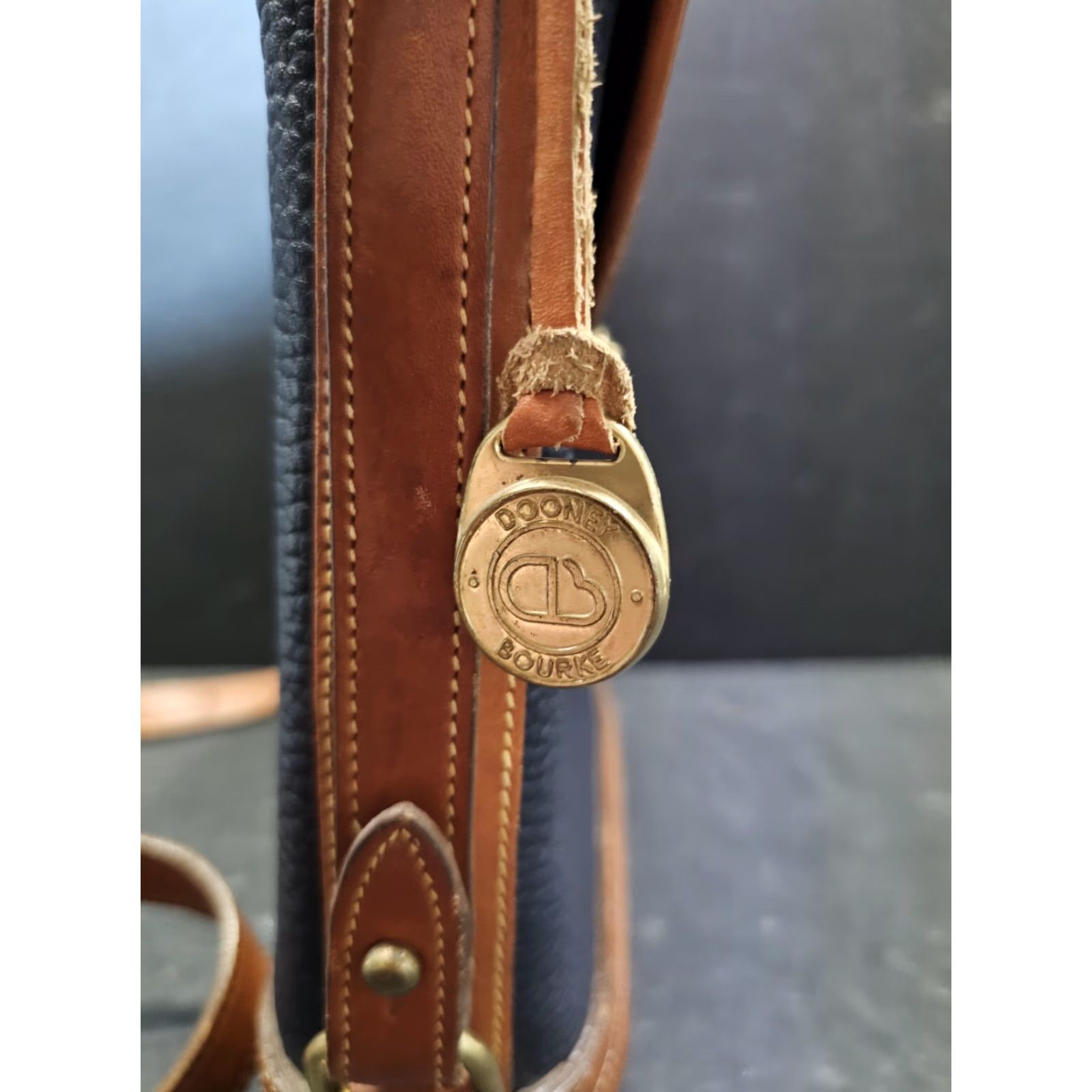Dooney & Bourke VINTAGE Dooney & Bourke All Weather Leather Pebbled Finish Spectator Bag Navy Blue Bucket Bag Women Medium Brown Leather Strap 11" Gold Hardware Size ONE SIZE - 7 Thumbnail