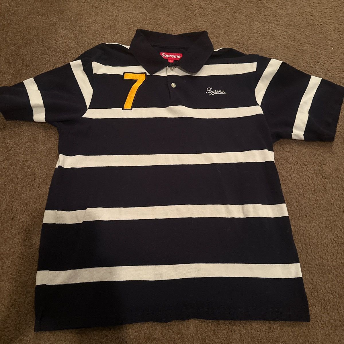 Supreme Supreme Cursive Polo “Navy Stripe” | Grailed