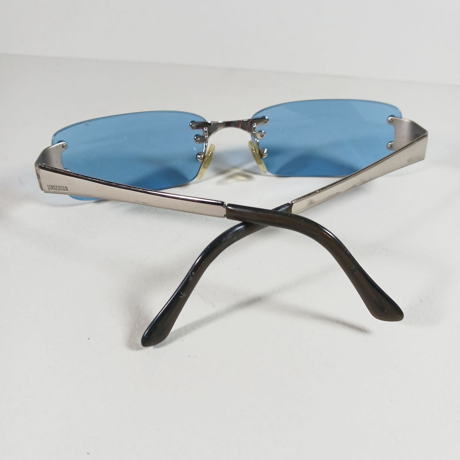 Moschino Moschino M3111-S Silver Metal Rimless Sunglasses Blue Lenses Size ONE SIZE - 9 Thumbnail