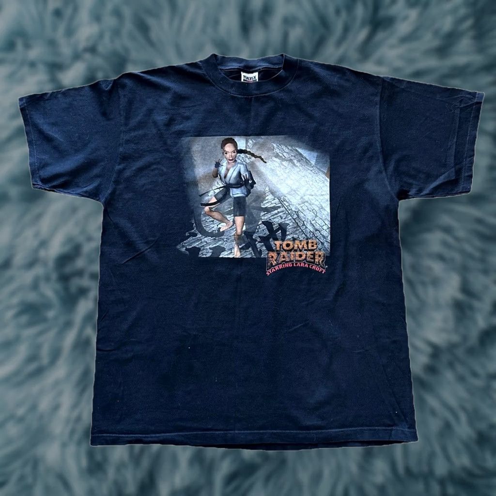 Tultex VINTAGE 90S LARA CROFT TOMB RAIDER VIDEO GAME KARATE PROMO T SHIRT XL NWOT Tultex Black Short Sleeve Cotton Graphics Mens Size US XL / EU 56 / 4 - 1 Thumbnail