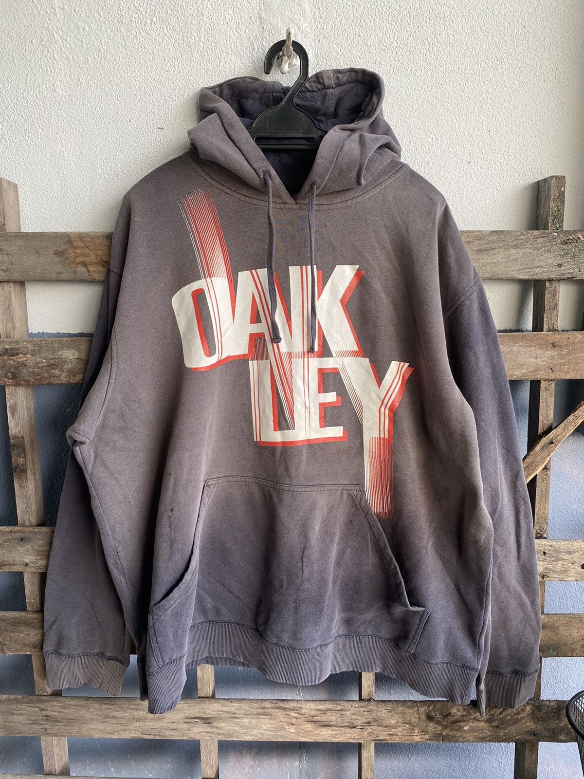 image of Oakley Spellout Sun Faded Hoodie in Dark Blue, Men's (Size XL)