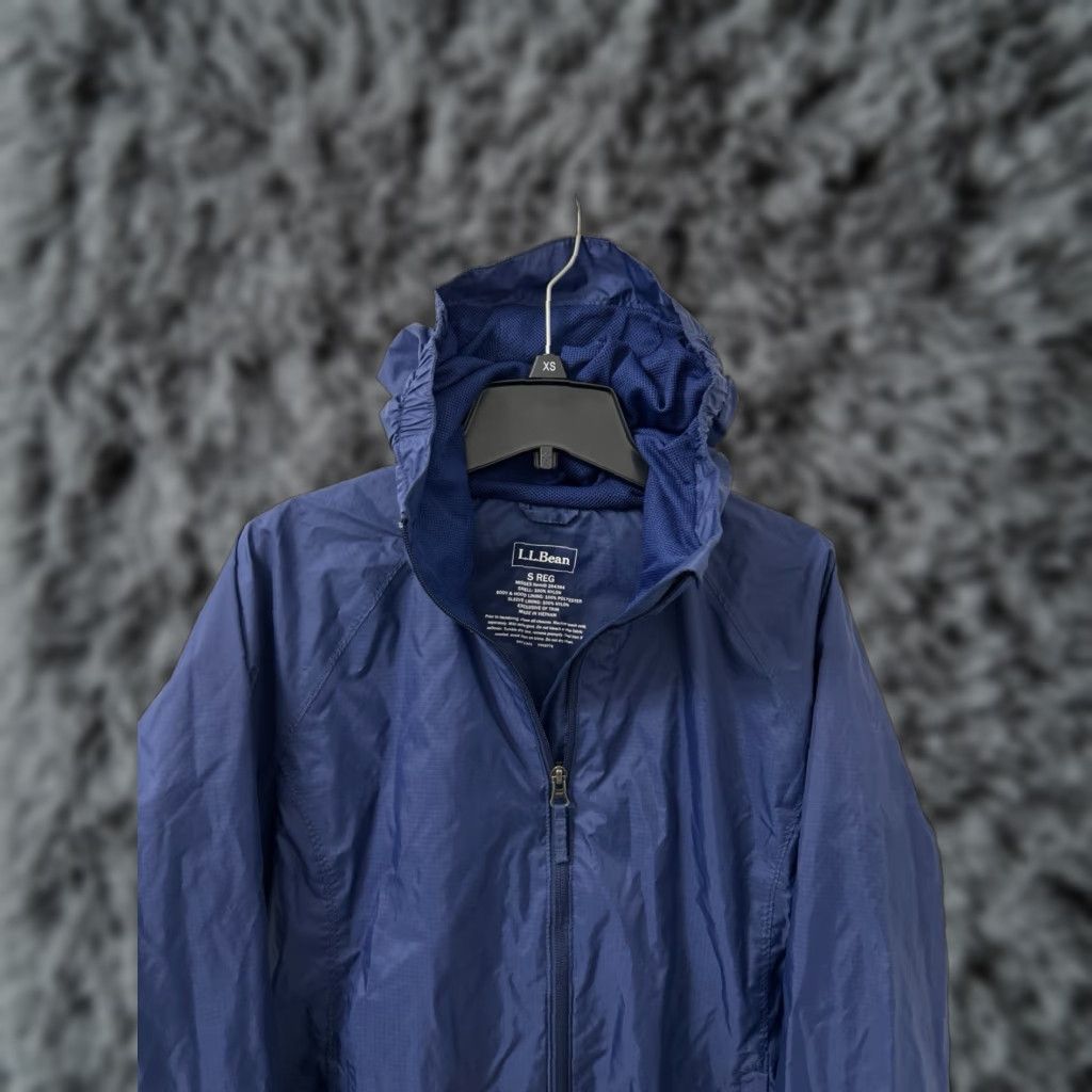 Rains LL Bean Rain Jacket Womens Sz Small Blue Full Zip Windbreaker 27.5” Length 21” Pit to Pit Packable Removable Hood Wind-Resistant 3 Size S / US 4 / IT 40 - 1 Thumbnail