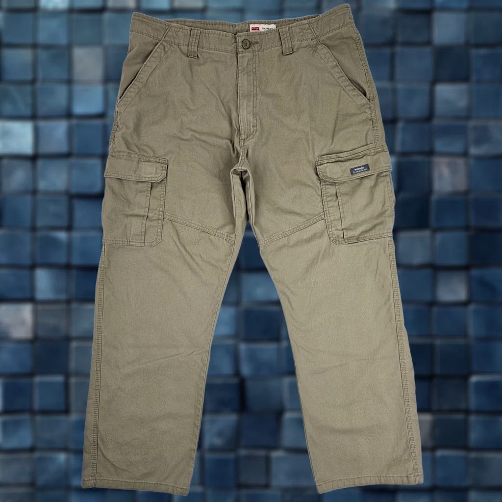 Wrangler Wrangler Relaxed Fit Cargo Stretch Workwear Cotton Pants – Men 38x32 Beige, 38x29 Fit, Cargo Pocket, Straight Leg, Cotton Spandex, Work Pants Size US 38 / EU 54 - 1 Thumbnail
