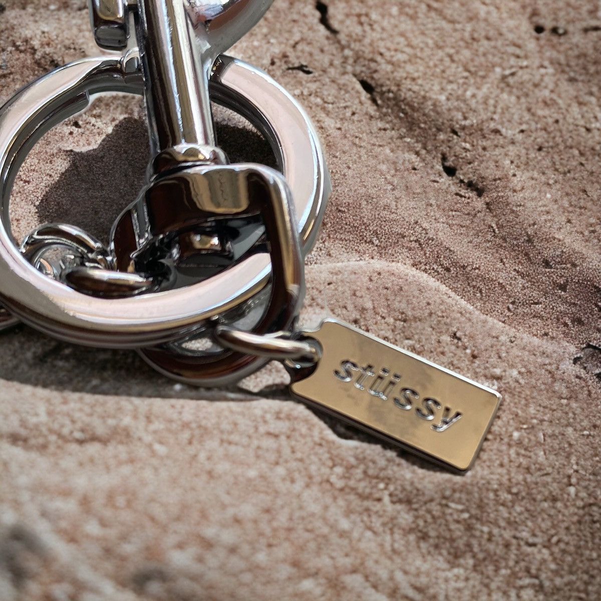 REVENGE GOLD ARCH LOGO KEYCHAIN