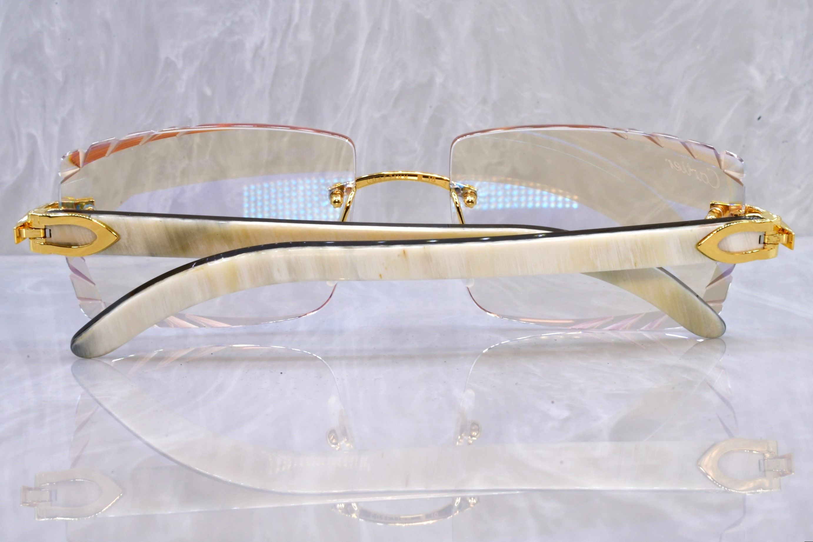 Cartier Cartier diamond cut horn sunglasses C decor buffs