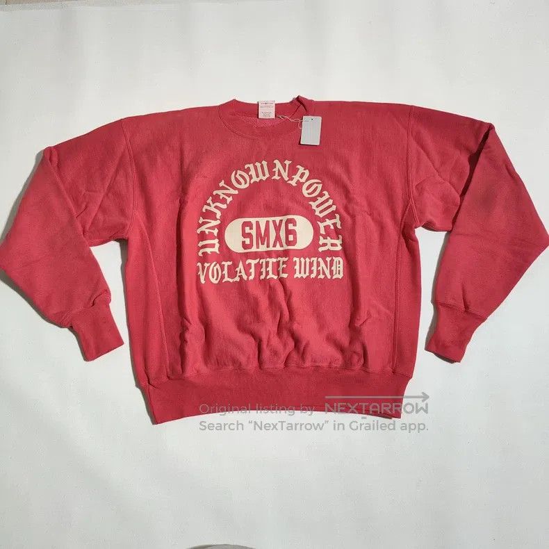 Saint Michael An old hoodie with a red pullover
