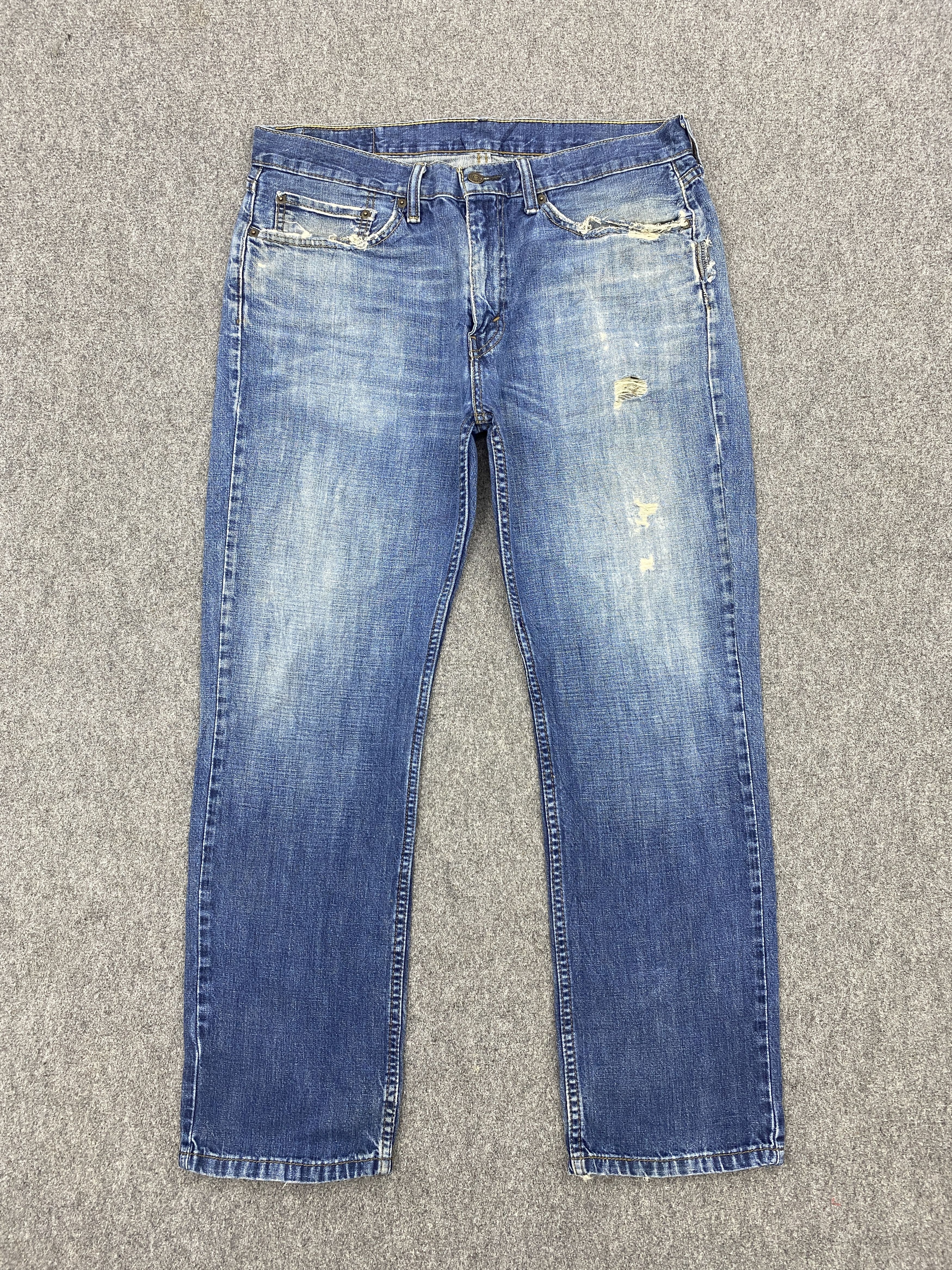 image of Faded Blue Vintage Levis 514 Jeans in Blue Denim, Men's (Size 35)