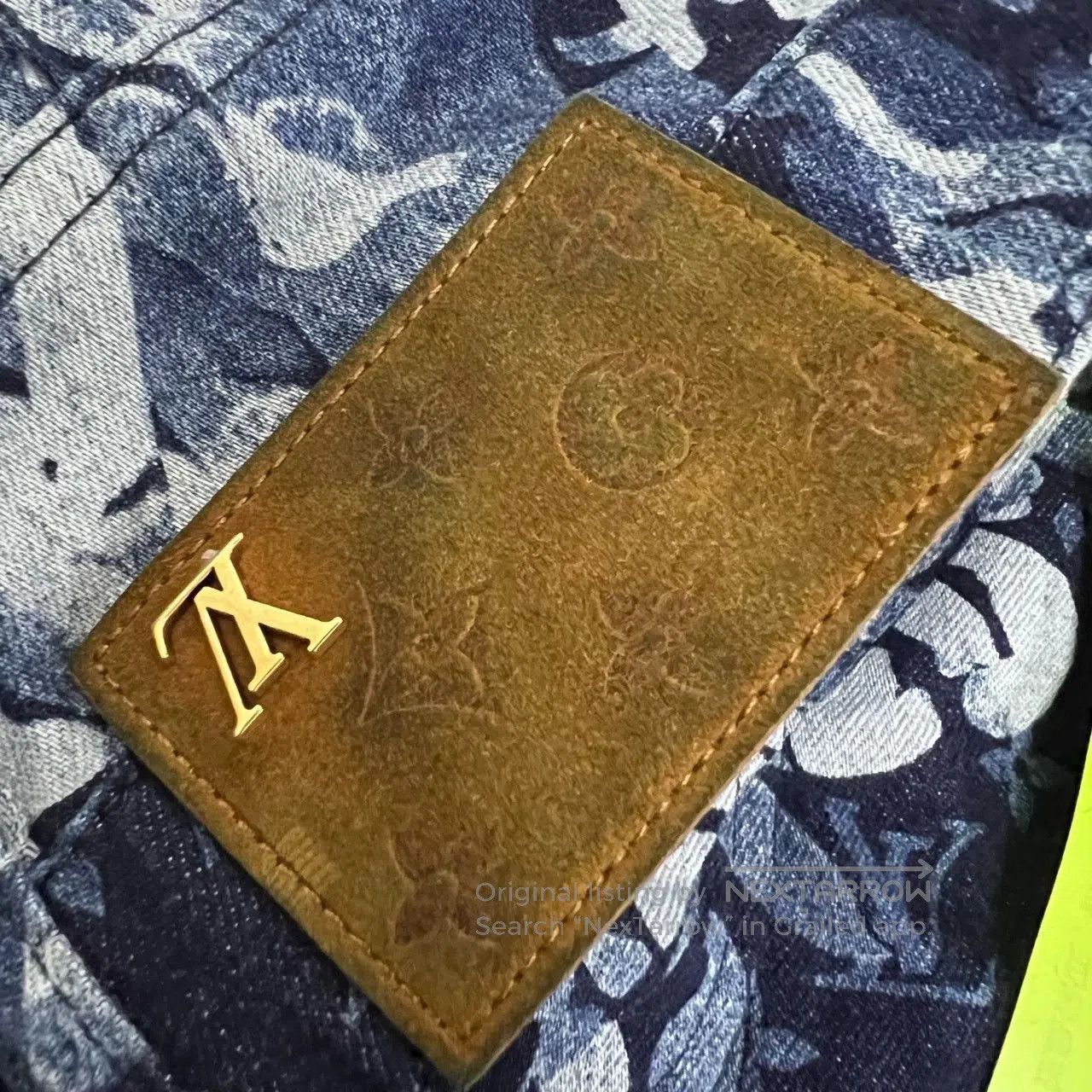 louis vuitton denim pants with monogram print.