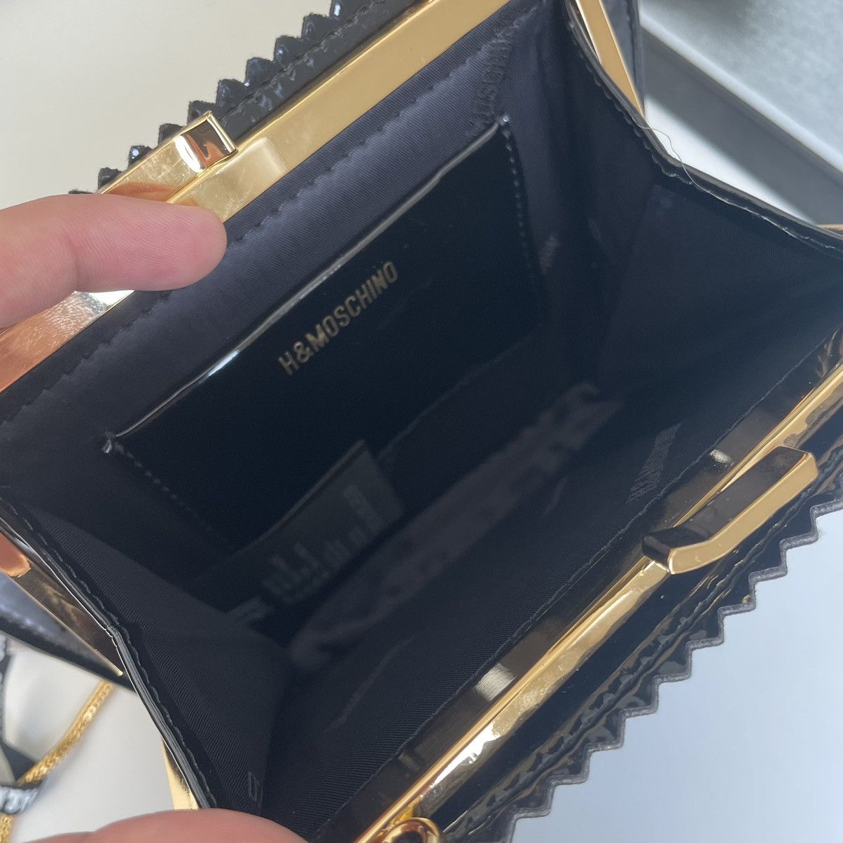 H&M × Moschino H&MOSCHINO condom clutch bag Size ONE SIZE - 8 Thumbnail