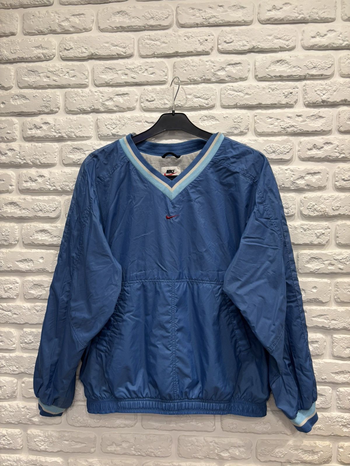 Nike men's pullover windbreaker deals