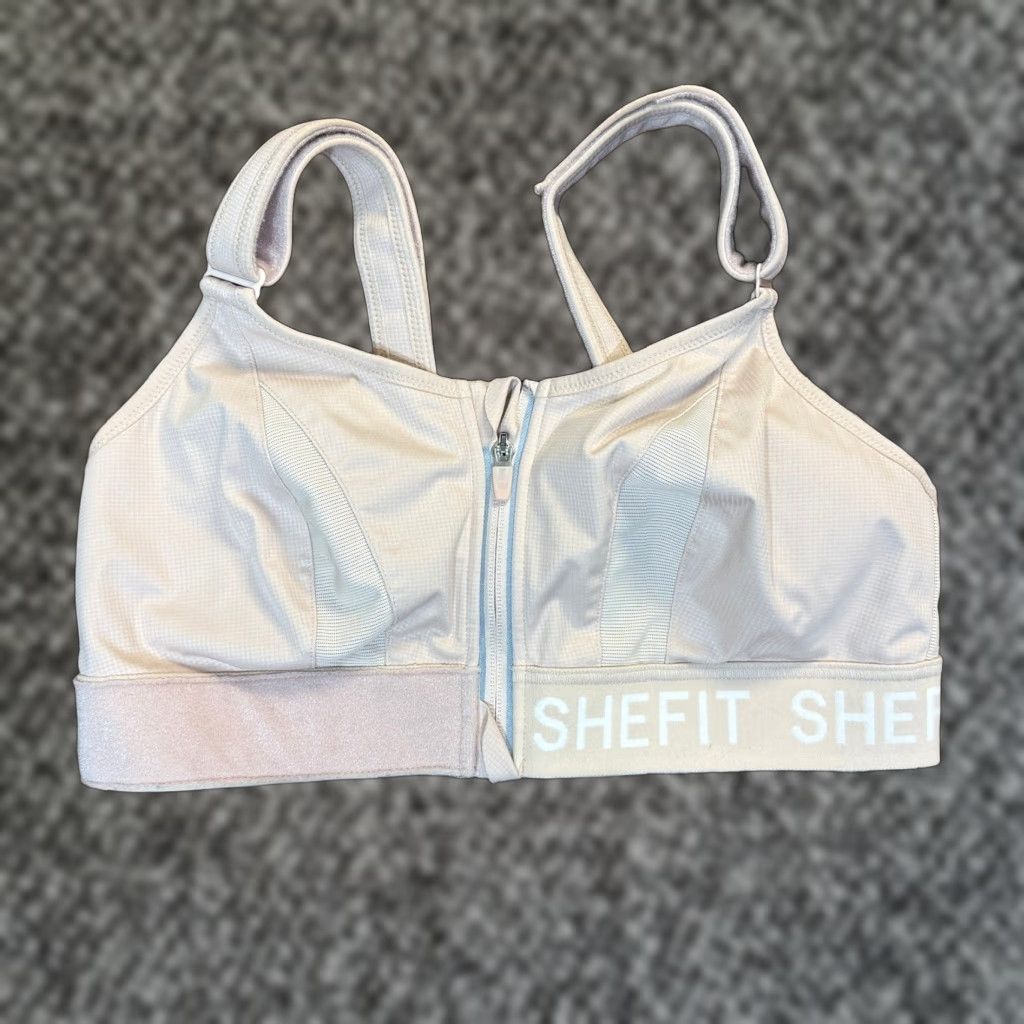 **SHEFIT 1 Luxe Front Zip Women's Beige Sports Bra** User: SHEFIT 1 Luxe Front Zip Women's Beige Sports Bra