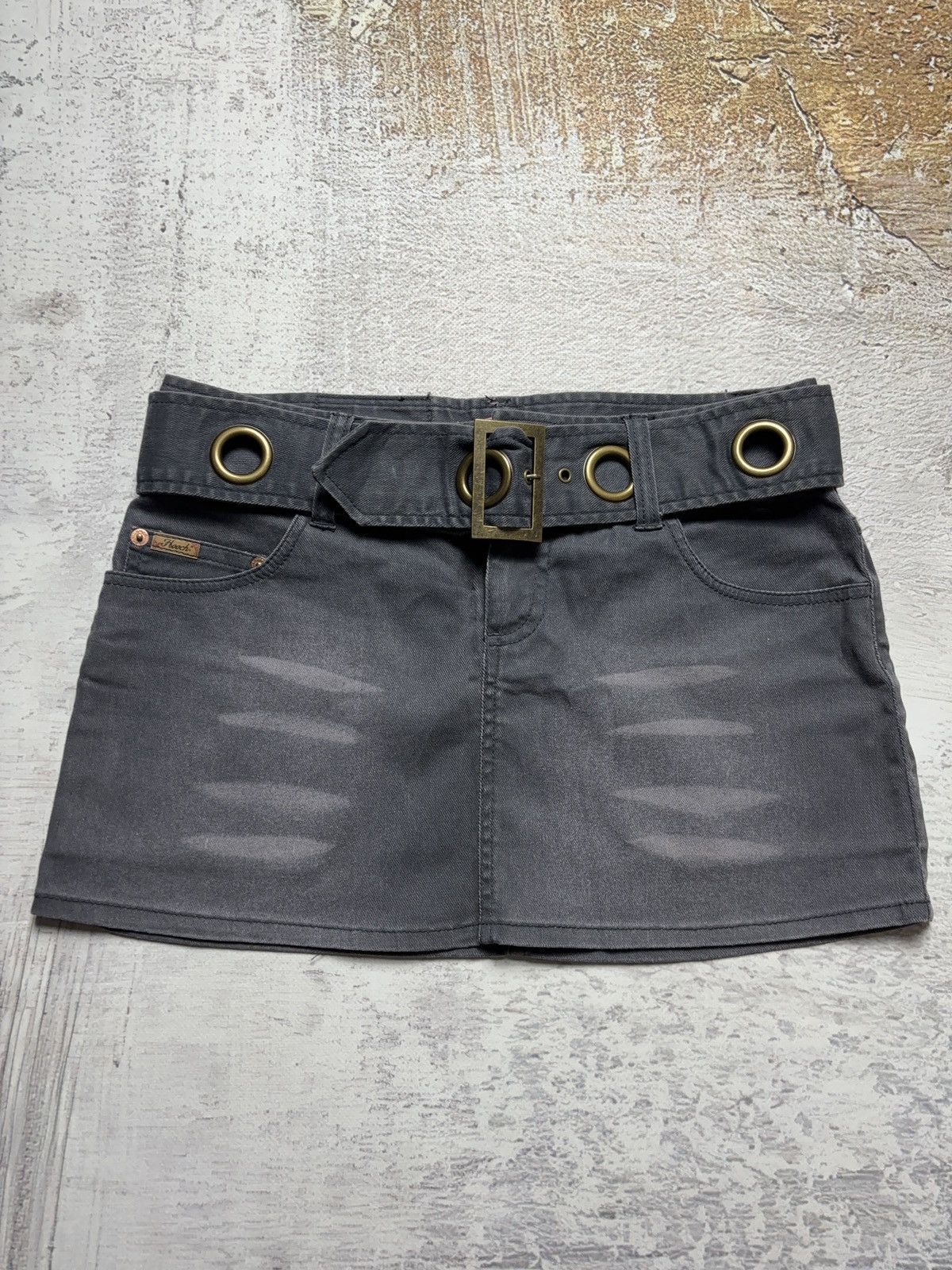 Belted vintage mini faded denim skirt