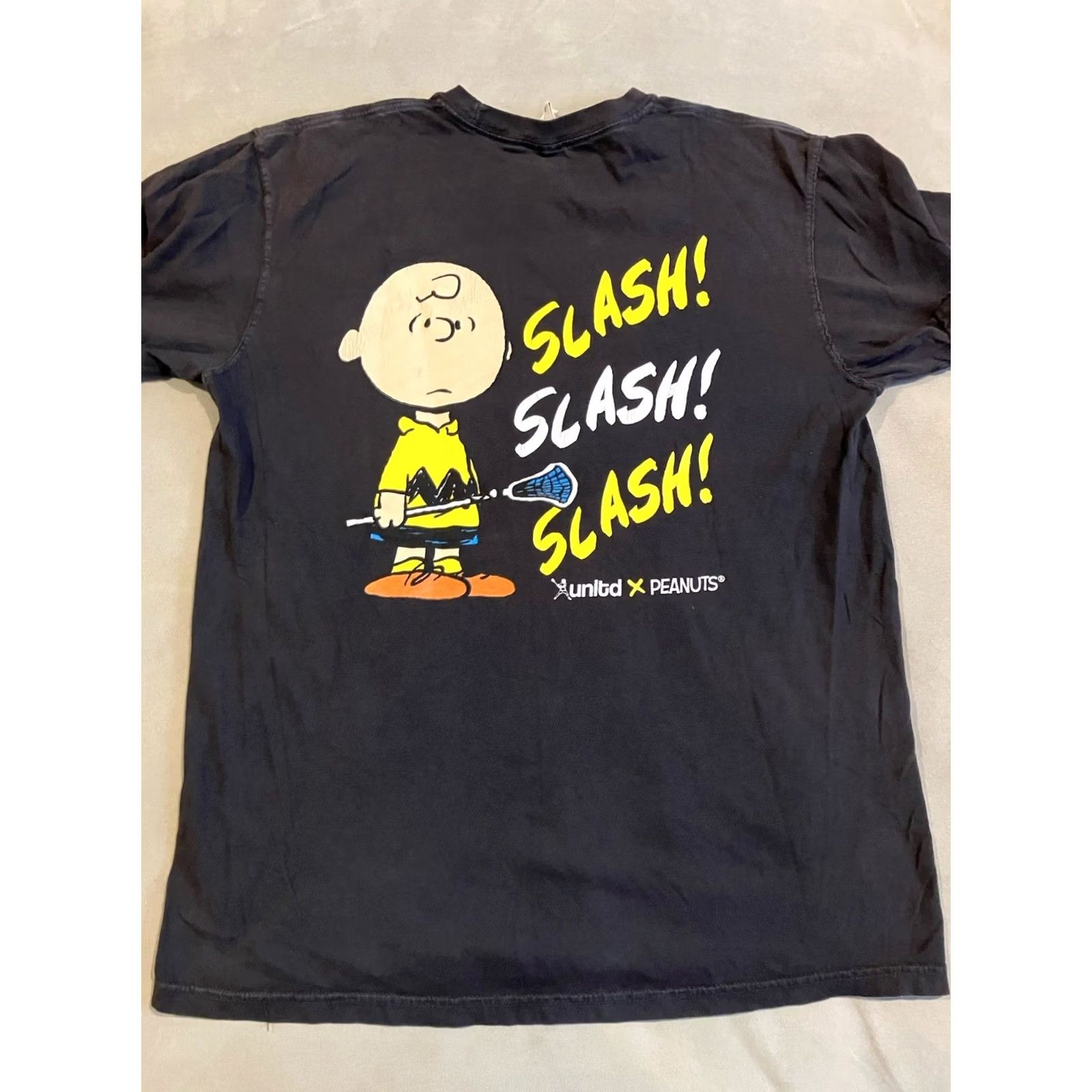 Comfort Colors WOW- LACROSSE UNLIMITED X PEANUTS- Charlie Brown - Slash/Slash/Slash T Shirt - M Shirt Mens Black M Peanuts Comfort Colors Short Sleeve Regular Size US M / EU 48-50 / 2 - 3 Thumbnail