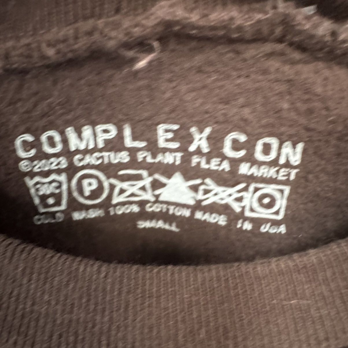 スウェット・トレーナー Cactus Plant Flea Market ComplexCon Smile! Crewneck Brown FW23 Cactus Plant Flea Market x ComplexCon 2023 Smile