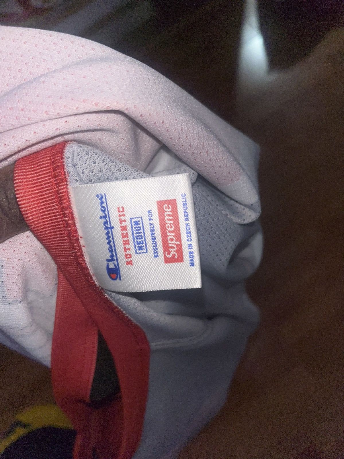 Champion × Supreme Red Supreme champion jersery Size medium Size US M / EU 48-50 / 2 - 5 Thumbnail