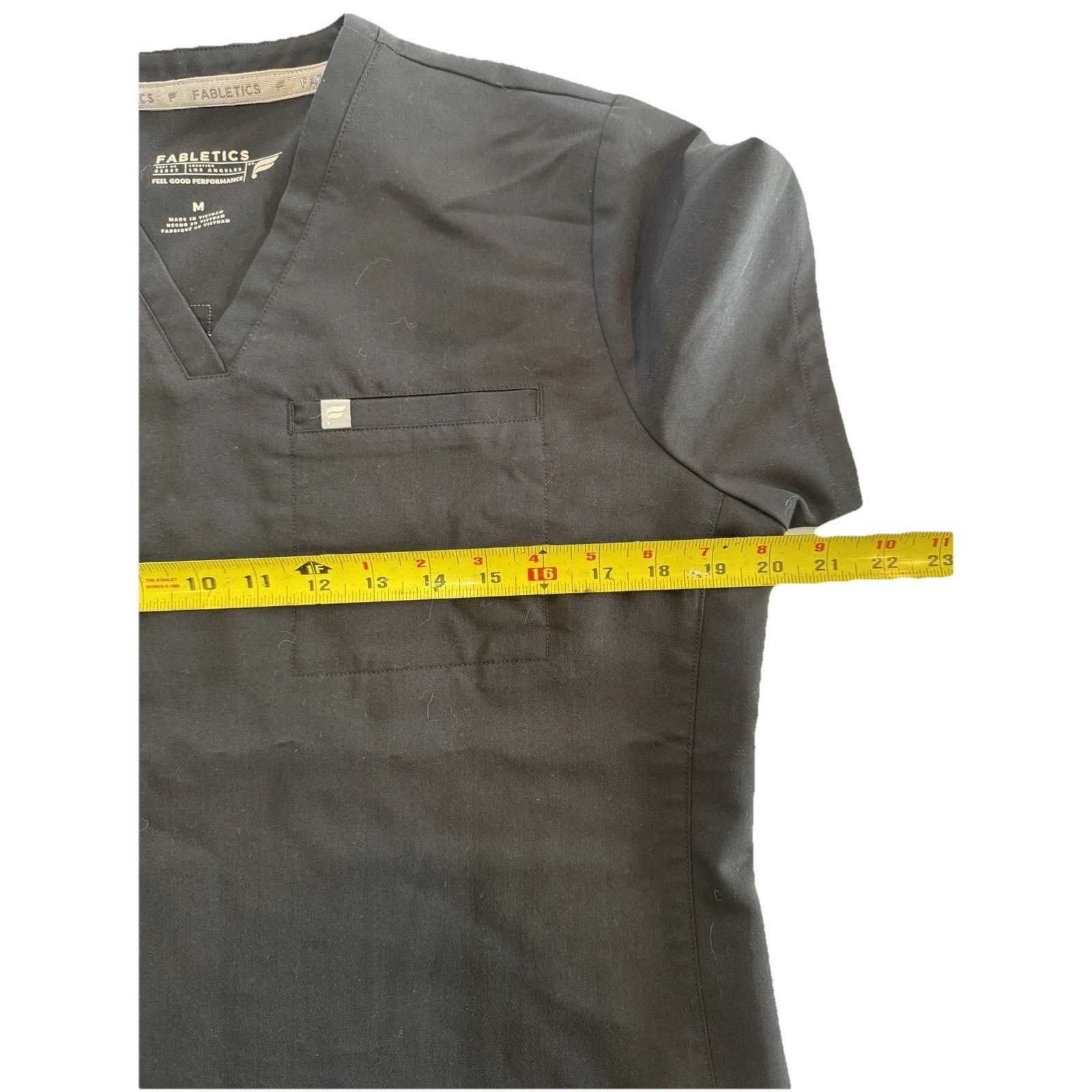 Fabletics Fabletics Scrub Top Womens M Black V-Neck Stretch pocket Size US M / EU 48-50 / 2 - 4 Thumbnail