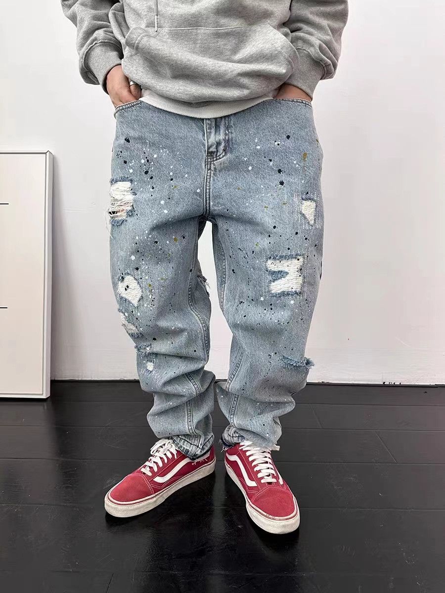 Splashed street hip-hop ripped jeans with small hems