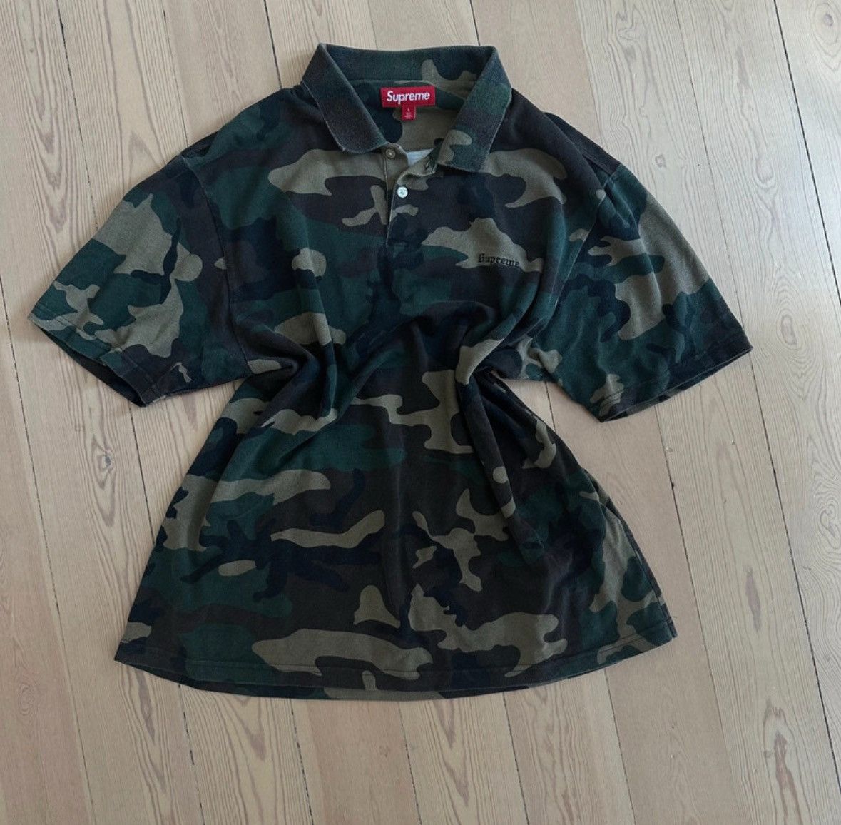 Supreme Supreme Washed Camo Polo in Woodland Camo | Grailed