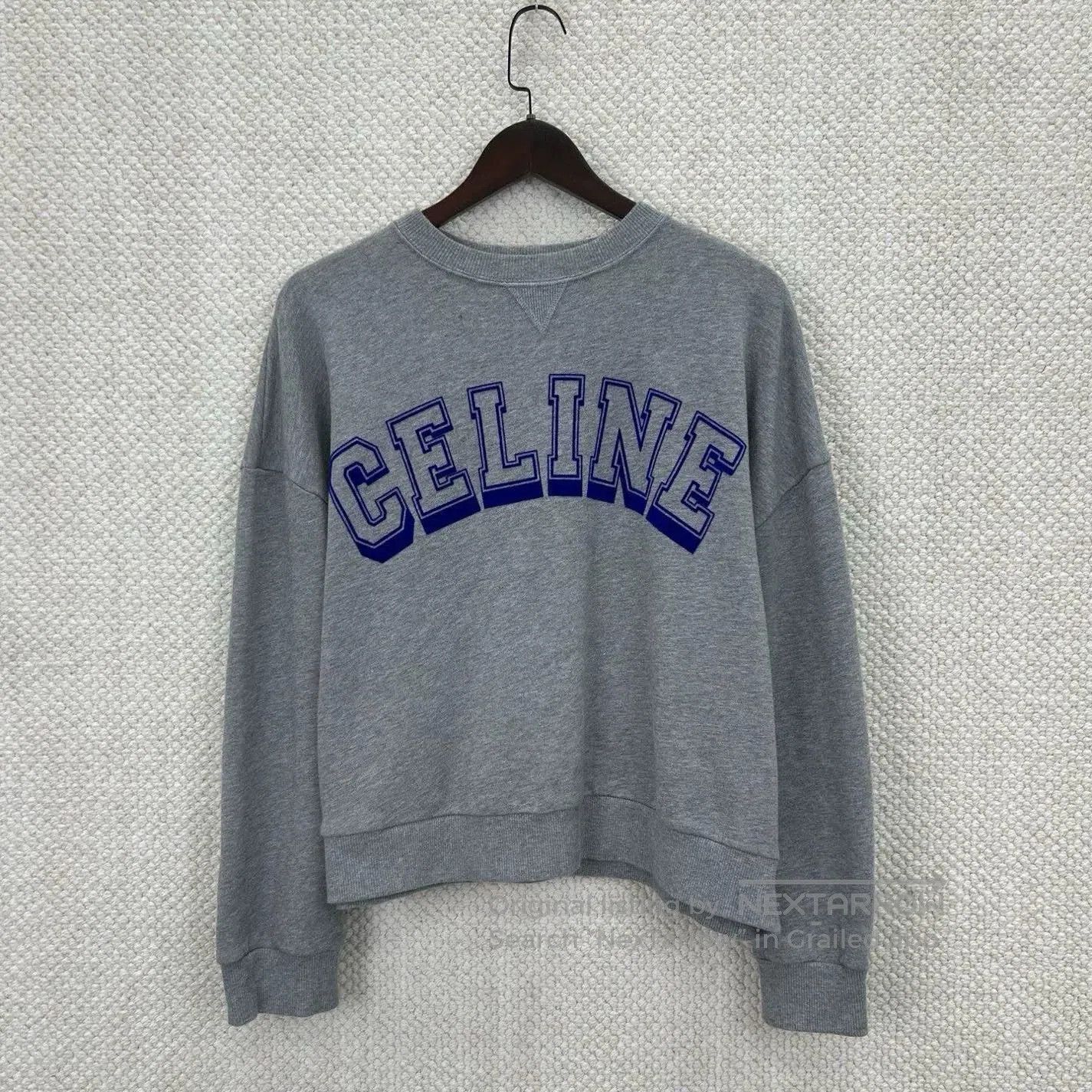 celine gray cropped sweatshirt with print.