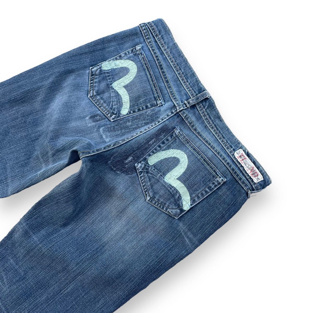 VINTAGE Y2K EVISU X PUMA DISTRESSED WASHED DENIM PANTS