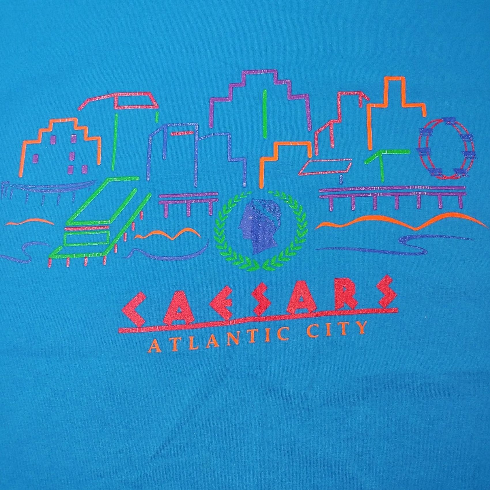Vintage Caesars Atlantic City Casino Shirt Men XXL Turquoise Geometric 1990s Vintage Caesars Atlantic City Shirt Mens 2XL Geometric Casino T-Shirt Vintage 90s Size US XXL / EU 58 / 5 - 2 Thumbnail