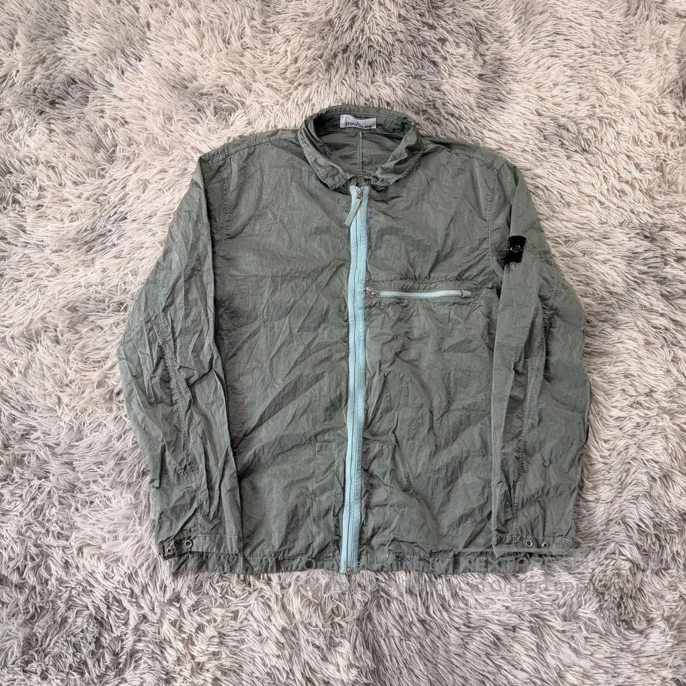 stone island sky blue nylon jacket.