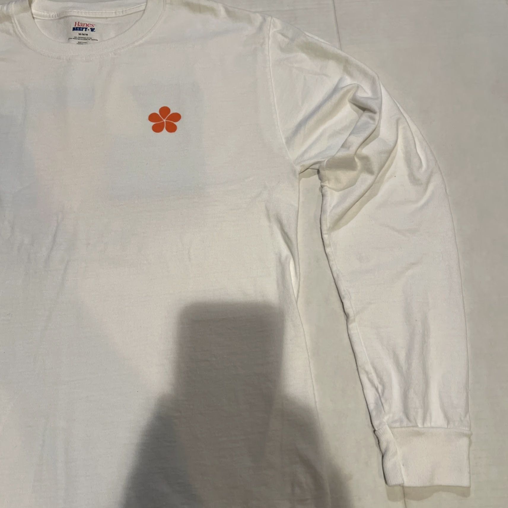 Hanes Mauna Kea Hotel Orange Flower Logo L/S Shirt Adult Medium White Hanes Shirt Logo Graphic Print Surfer Retro Men Women Size US M / EU 48-50 / 2 - 4 Thumbnail