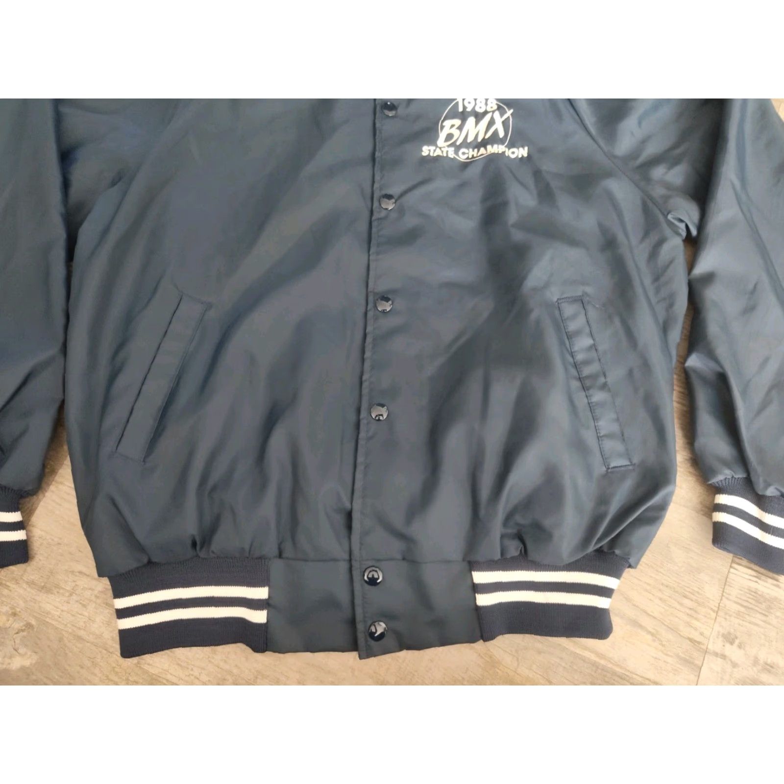 Augusta Sportswear VINTAGE Augusta Sportswear Satin Bomber Jacket Mens 1988 Michigan BMX State Champion Dark Blue Short Sleeve Casual Winter Summer Spring Fall Sz L Size US L / EU 52-54 / 3 - 7 Thumbnail