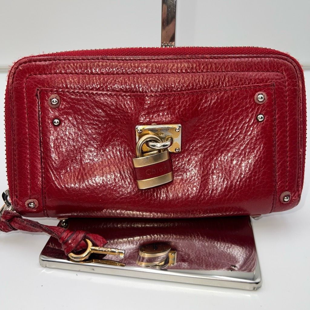 image of Chloe Lambskin Paddington Lock Zip Wallet With Key in Red, Women's